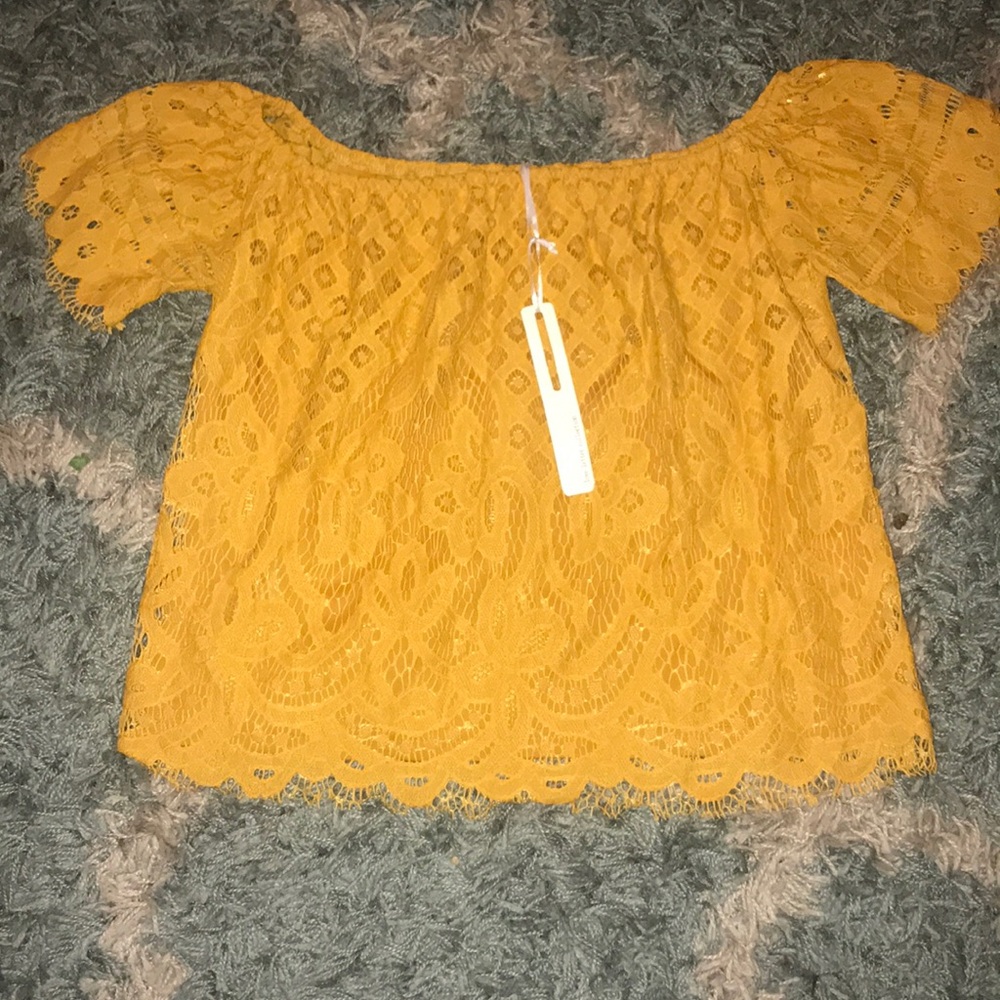 Beautiful Lace off shoulder top. New with tags.
